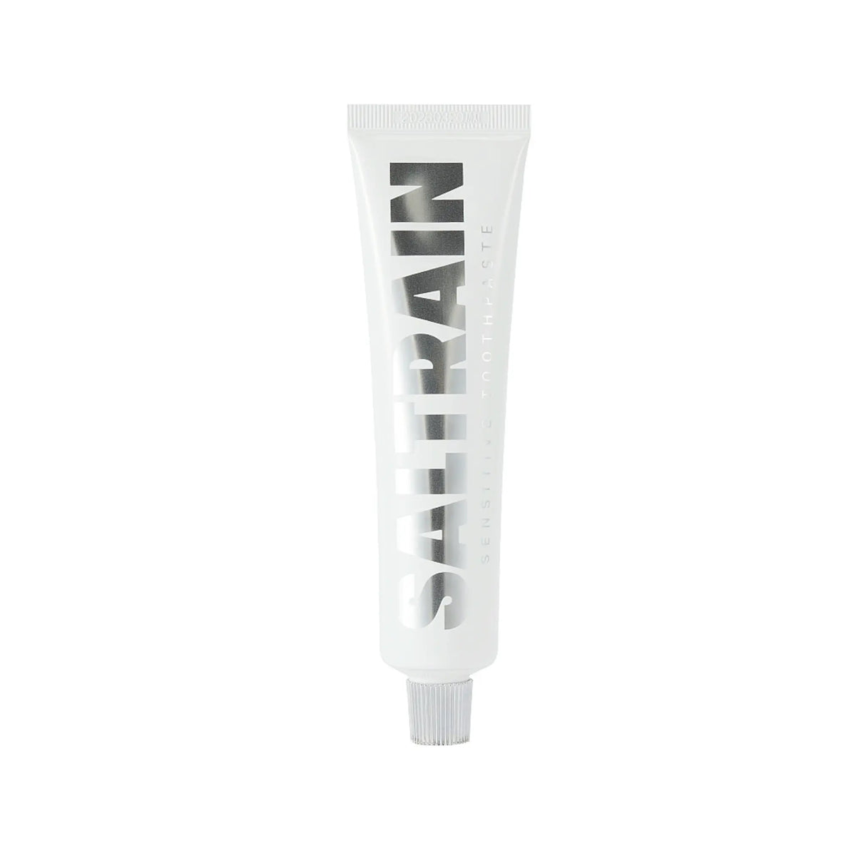 Saltrain toothpaste tube with black text on a white background
