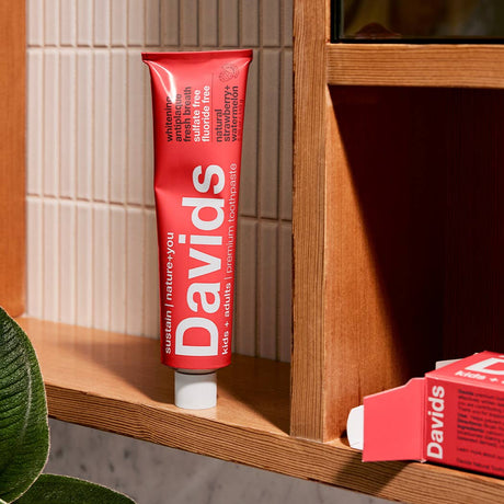 Davids Kids + Adults Natural Premium Toothpaste - Strawberry Watermelon  packaging being displayed on a shelf