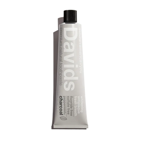 Close up of Davids Premium Natural Toothpaste - Charcoal and Peppermint toothpaste tube