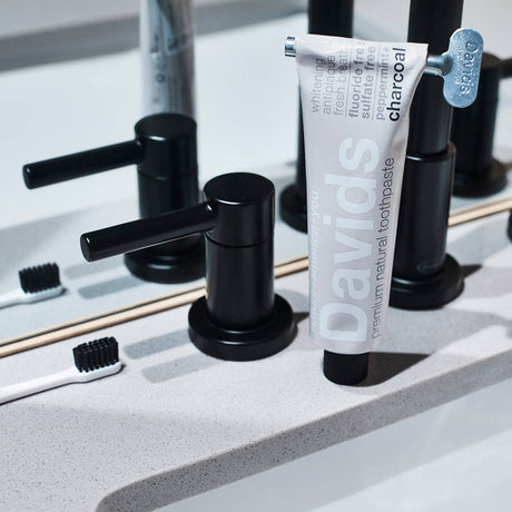 Davids Premium Natural Toothpaste - Charcoal and Peppermint flavour tube with key