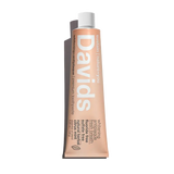 Davids natural citrus mint toothpaste tube on a white background