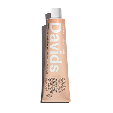 Davids natural citrus mint toothpaste tube on a white background