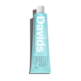 Tube of Davids toothpaste on a white background