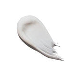 Smear of Davids Natural Toothpaste on a white background