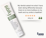Fygg toothpaste tube with customer review on a white background