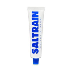 Saltrain gray salt toothpaste tube on a white background