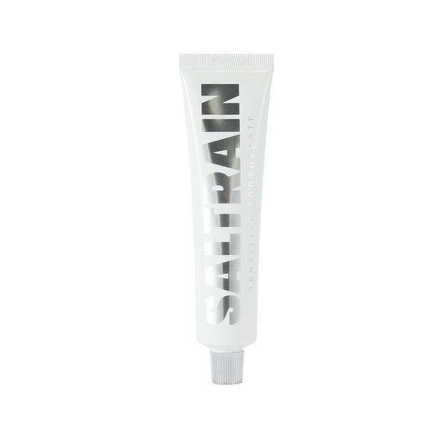 Saltrain toothpaste tube with black text on a white background
