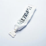 Saltrain branded toothpaste tube on a light gray background