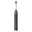 An electric toothbrush with a green and blue brush head, featuring text that highlights its 360-degree surround capability and deep cleaning action.